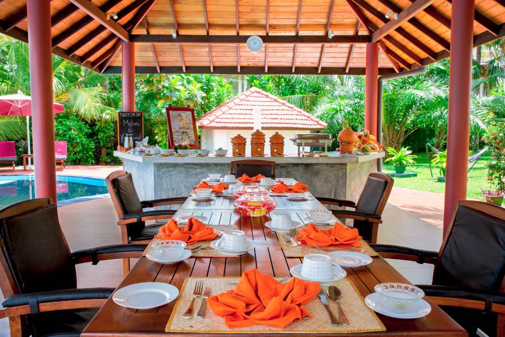ayurvedic hotel out door dining table view bigger picture